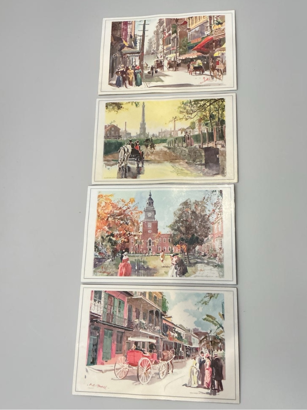 Vintage 1956 C.C. Beall Set of 4 Laminated Placemats Americana Watercolor Scenes